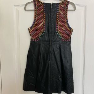 Faux leather dress with details